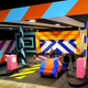 Illustration for article titled Street Artist Takes Over Derelict Gas Station with Brilliant Results